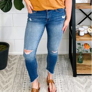 NWT Suzy Light Wash Distressed Angle Hem Skinny Jean